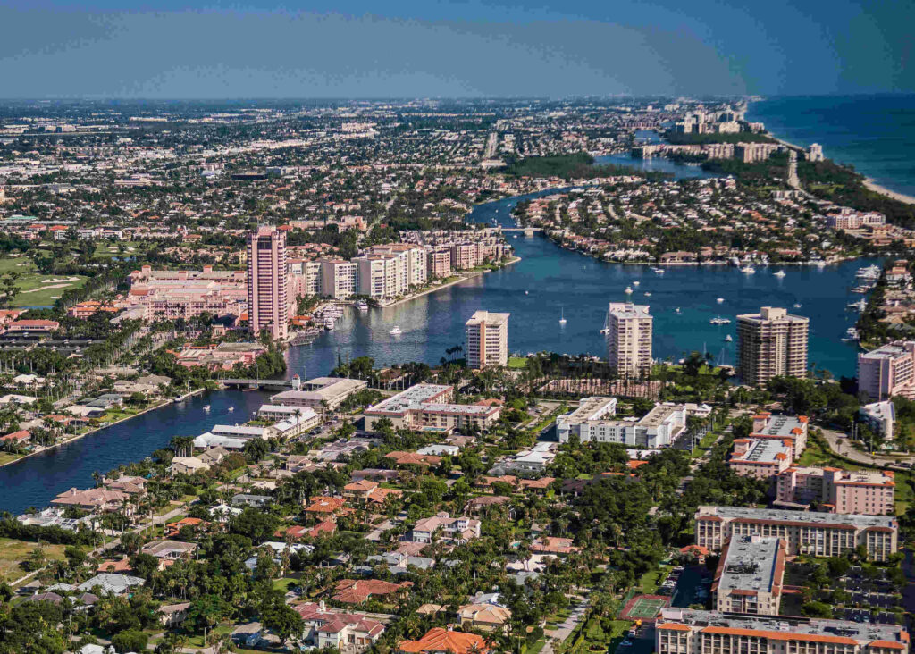 An aerial view of Boca Raton's coastal city landscape and waterways, representing the geographic service area for Boca Raton Motorcycle Accident Lawyers.